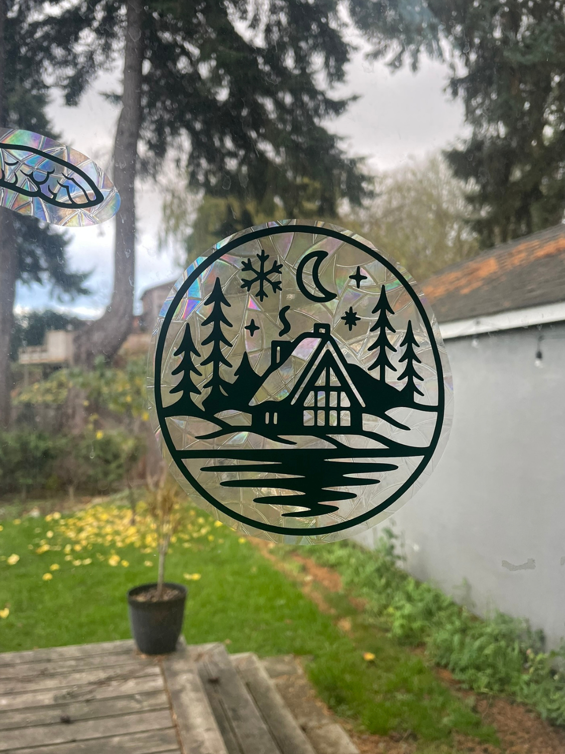 Cozy Winter Cabin Suncatcher